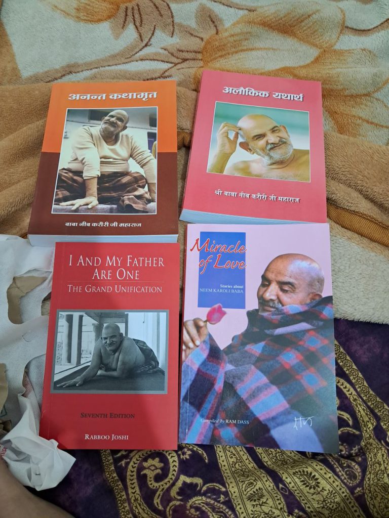 The books about neem karoli baba that I had purchased from the ashram's store.